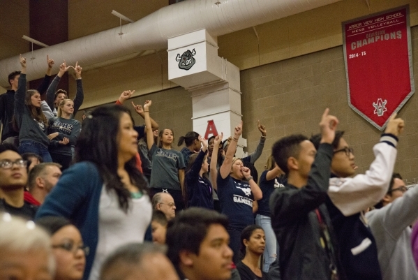 Shadow Ridge High School fans celebrate at the end of the Sunset Region girls volleyball sem ...