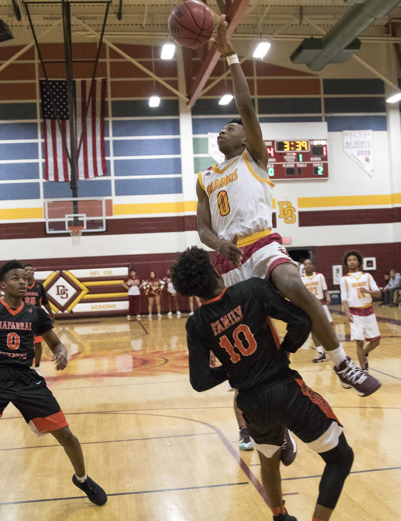 Del Sol’s Devonte Anton Villarta (10) shoots over Chaparral’s Cairyn Bray during ...