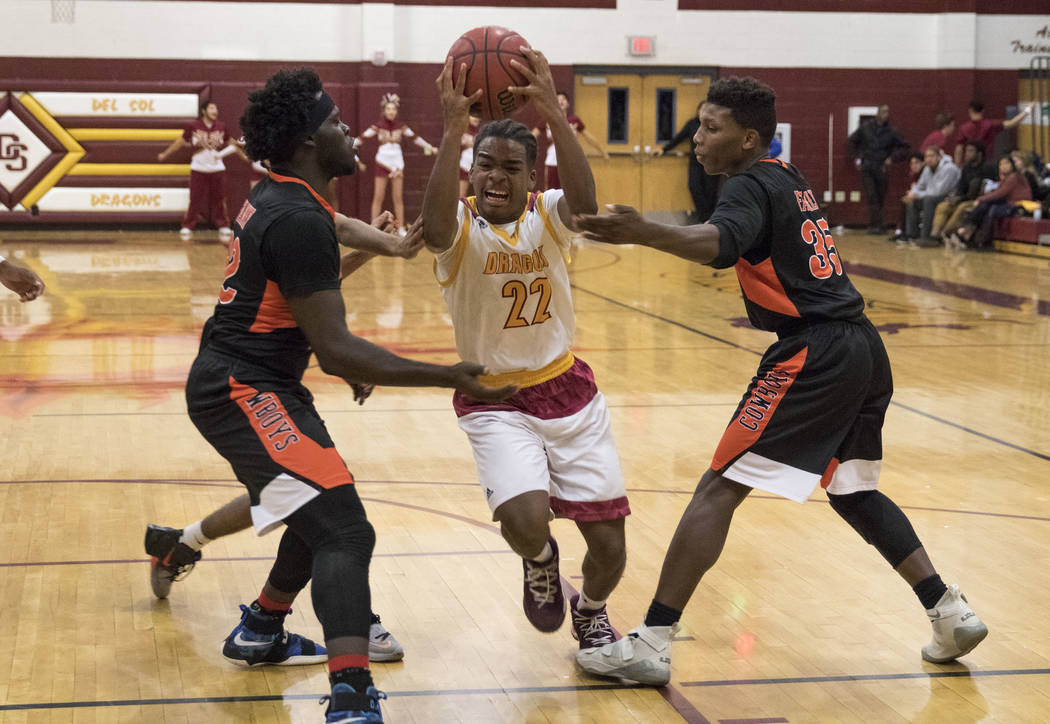 Del Sol’s Keith Seldon (22) goes up for a shot against Chaparral’s Dejonte Allen ...