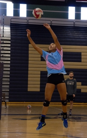 Shadow Ridge girls volleyball player Eadara Files sets the ball during practice at Shadow Ri ...