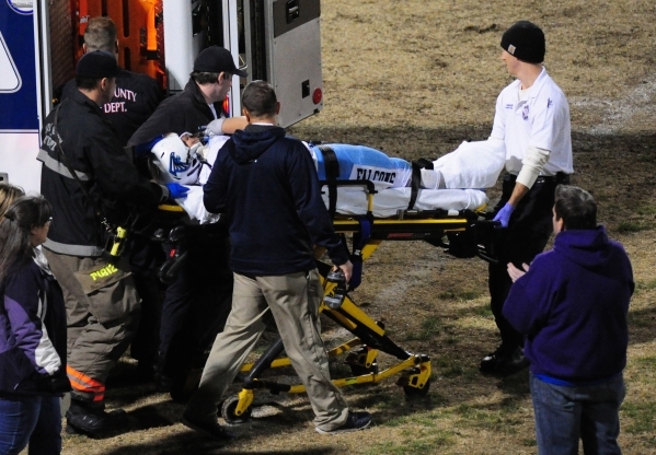Foothill junior defensive tackle Ian McCullough is loaded into an ambulance after being inju ...