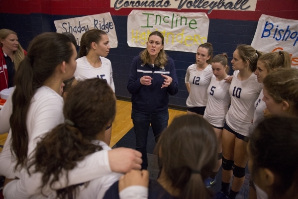 Shadow Ridge High School girls volleyball coach Karissa Guthrie talks to her players during ...