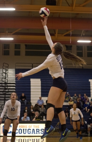 Shadow Ridge‘s Whittnee Nihipali (15) hits the ball during the Division I state semifi ...
