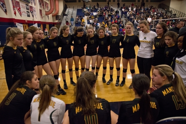 Bishop Manogue regroups during the Division I state semifinal match between Shadow Ridge and ...