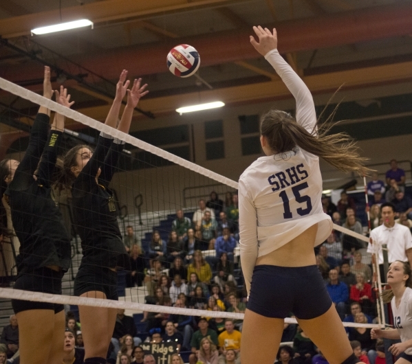Shadow Ridge‘s Whittnee Nihipali (15) hits the ball during the Division I state semifi ...