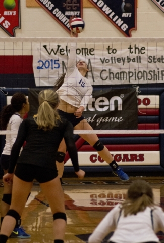 Shadow Ridge‘s Whittnee Nihipali (15) hits the ball during the Division I state semifi ...