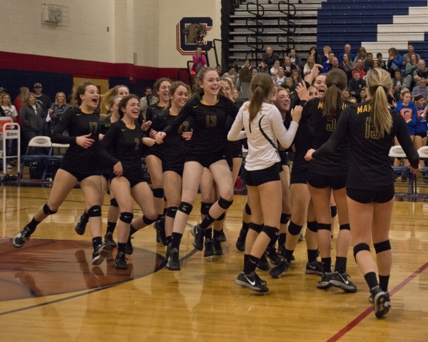 Bishop Manogue celebrates after winning their Division I state semifinal match between Shado ...