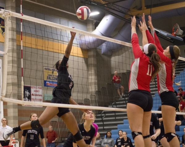 Faith Lutheran‘s Tayah Washington (2) hits the ball during the division I-A state voll ...