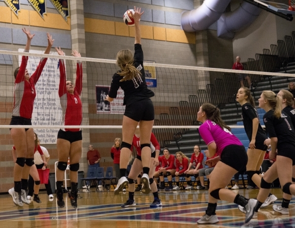 Faith Lutheran‘s Bobbi Tharaldson (11) hits the ball during the division I-A state vol ...