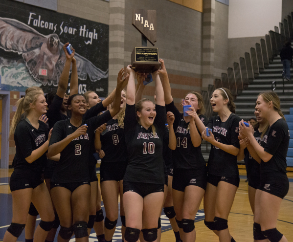 Faith Lutheran celebrates after winning the division I-A state volleyball final match betwee ...