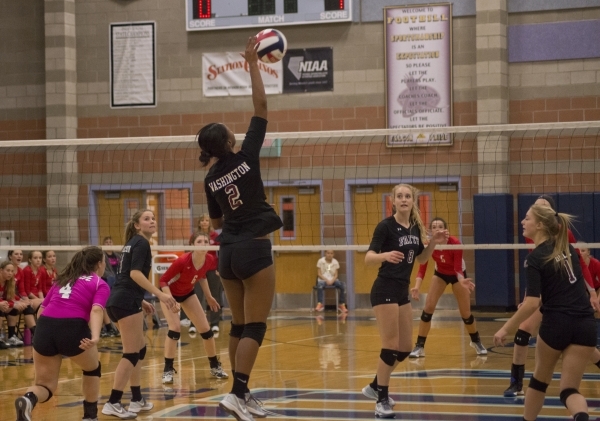 Faith Lutheran‘s Tayah Washington (2) hits the ball during the division I-A state voll ...