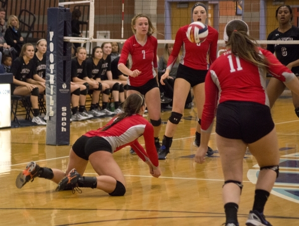Truckee‘s Madison Haley (9) dives for the ball during the division I-A state volleybal ...