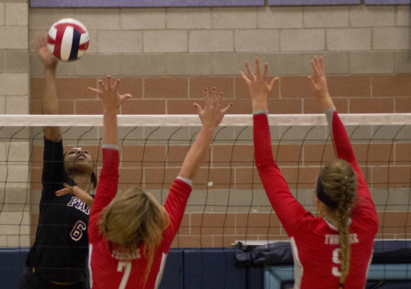 Faith Lutheran‘s Sydney Washington (6) hits the ball during the Division I-A state vol ...