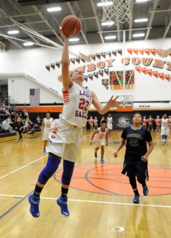 Bishop Gorman forward Raychel Stanley (23) scores on a fast break layup against Foothill in ...