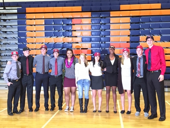 All 11 Bishop Gorman student-athletes pose after signing their National Letters of Intent on ...