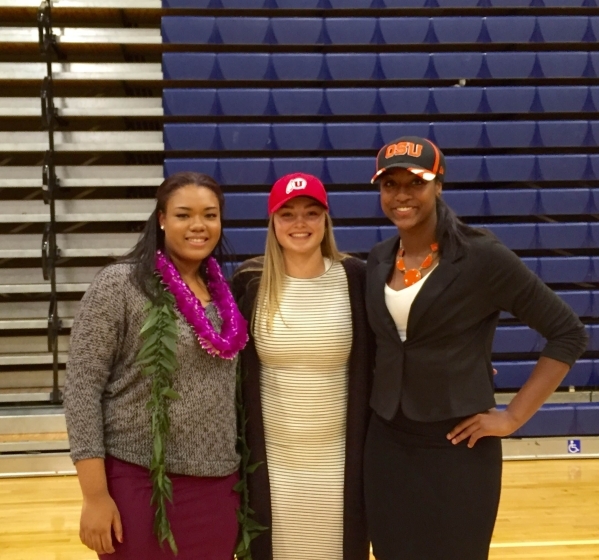 Bishop Gorman girls basketball players, from left, Raychel Stanley, Megan Jacobs and Madison ...