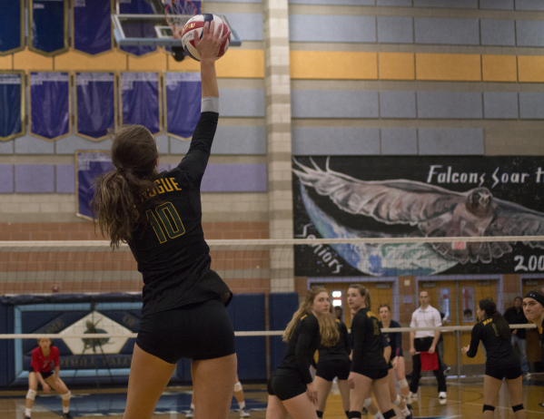 Bishop Manogue‘s Katelyn Oppio (10) serves during the division I state volleyball fina ...
