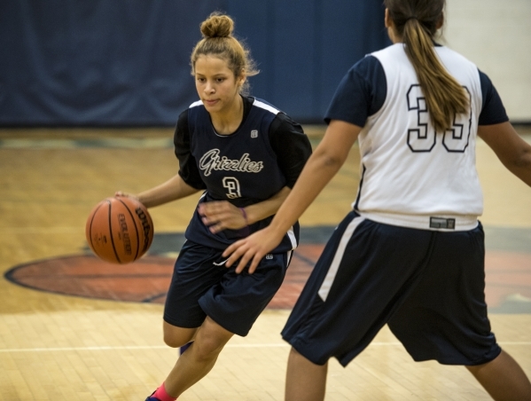 Essence Booker drives to the basket during practice at Spring Valley High School in Las Vega ...