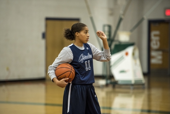 Kayla Harris holds the ball during basketball practice at Spring Valley High School in Las V ...