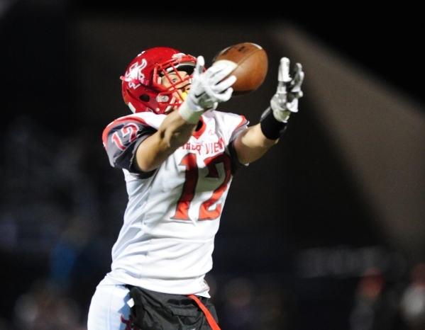 Arbor View defensive back Noah Noce intercepts a Bishop Gorman pass in the first half of the ...