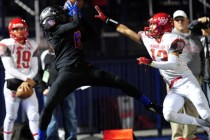 Bishop Gorman wide receiver Austin Arnold catches a pass for a first down in front of Arbor ...