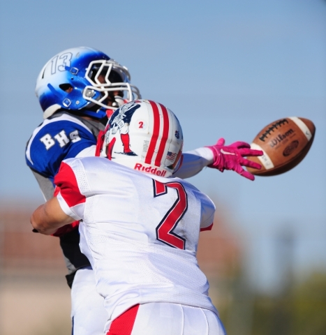 Basic Wolves wide receiver De‘Shawn Eagles (13) is unable to make a catch as Liberty c ...