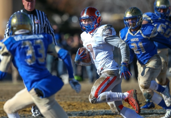 Bishop Gorman‘s Biaggio Ali Walsh (7) runs against Reed in an NIAA Division I playoff ...