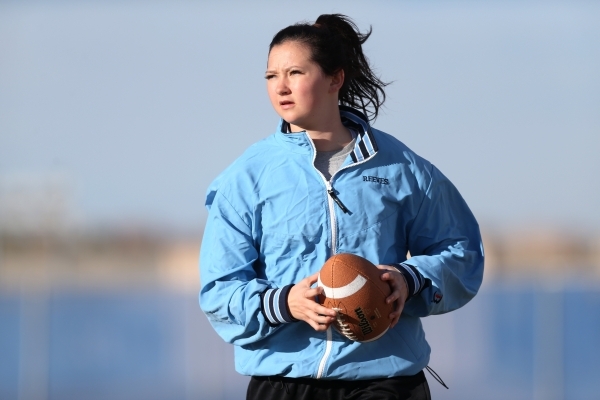 Centennial‘s Courtney Reeves walks with the ball during a girl‘s flag football p ...