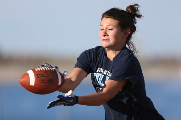 Centennial‘s Ashley Marshall reaches for a catch during a girl‘s flag football p ...