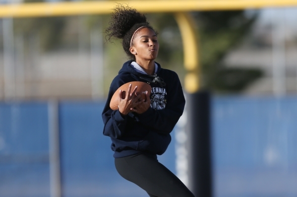 Centennial‘s Aliyah Wyrick makes a catch during a girl‘s flag football practice ...
