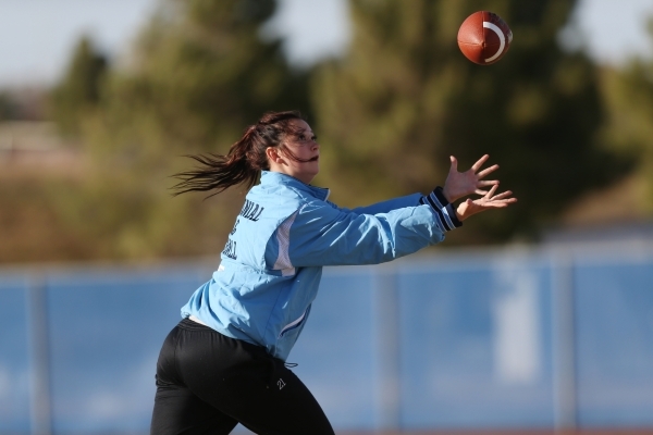 Centennial‘s Courtney Reeves reaches for a catch during a girl‘s flag football p ...
