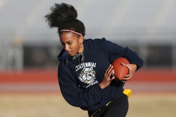 Centennial‘s Aliyah Wyrick runs the ball during a girl‘s flag football practice ...