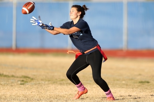 Centennial‘s Ashley Marshall reaches for a catch during a girl‘s flag football p ...