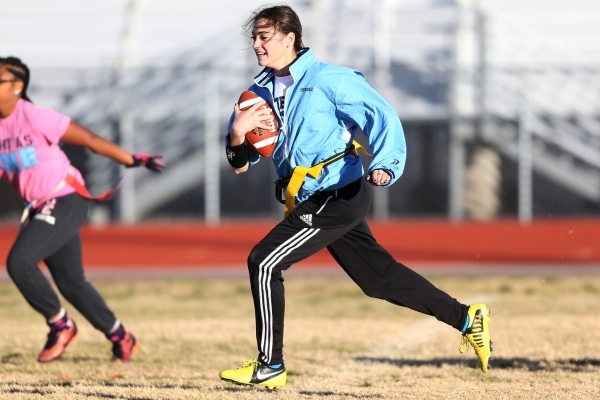 Centennial‘s Cienna Mendez runs the ball during a girl‘s flag football practice ...