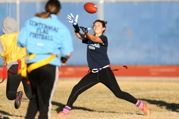 Centennial‘s Ashley Marshall reaches for a catch during a girl‘s flag football p ...