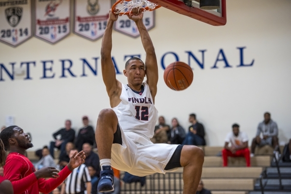 Tristan Clark of Findlay Prep dunks the ball against Planet Athlete Academy at Henderson Int ...