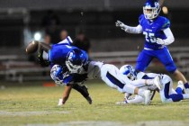 Basic Wolves safety Jake Waldron forces Green Valley Gators wide receiver Marquez Powell to ...