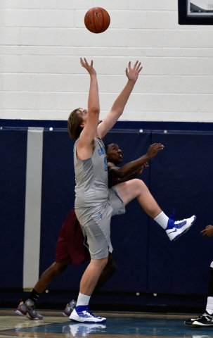 Canyon Springs‘ Thomas Sipan, left, and Cimarron-Memorial‘s KeAnte Huddleston re ...