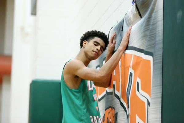 Mojave‘s Daryl Adams (3) reacts after missing a shot against Churchill County in their ...