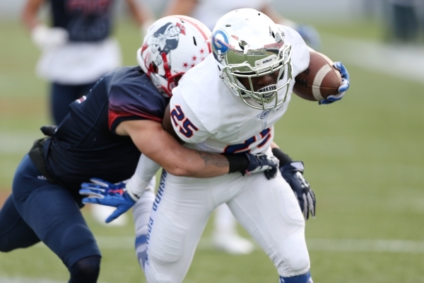 Bishop Gorman‘s Tyjon Lindsey (25) runs the ball against Liberty in the Division I sta ...