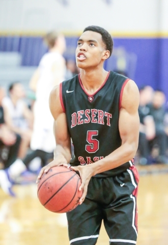 Desert Oasis senior forward Aamondae Coleman (5) sets up for a free throw during a basketbal ...