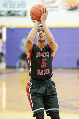 Desert Oasis senior forward Aamondae Coleman (5) attempts a shot from the free-throw line du ...