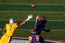 Sunset All-Stars quarterback Tanoa Alapati (21) throws an interception to Sunrise safety Zac ...
