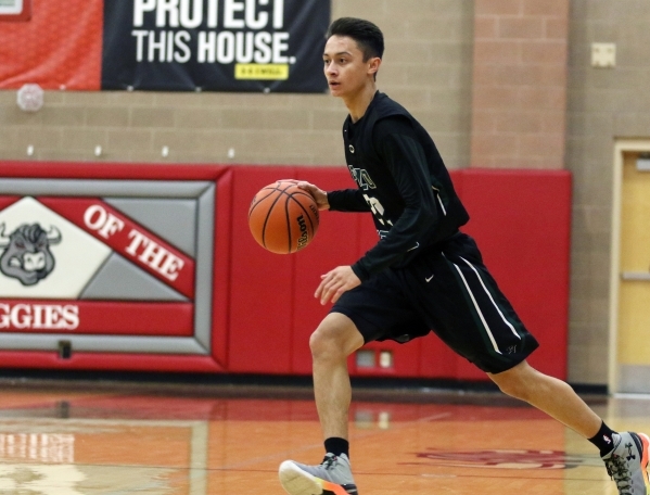 Palo Verde‘­s Taylor Miller dribbles the ball during a basketball game against Arbor V ...