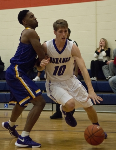 Durango High School‘s Jason Landman (10) works the ball around Lynwood High School&lsq ...