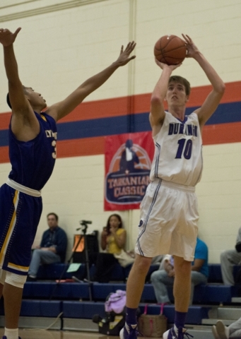 Durango High School‘s Jason Landman (10) takes a shot as Lynwood High School‘s O ...