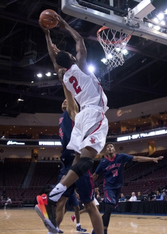 Victory Prep‘s Jarred Vanderbilt (2) takes the ball to the net during the fourth annua ...