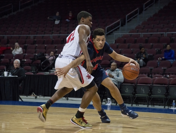 Findlay Prep‘s Skylar Mays (4) works his way around a Victory Prep player during the f ...