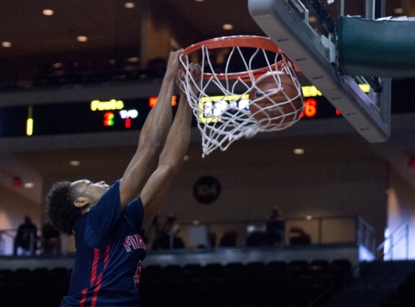 Findlay Prep‘s PJ Washington (5) dunks the ball during their game against Victory Prep ...