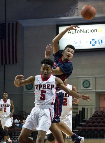 Findlay Prep‘s Skylar Mays (4) passes the ball after being stopped by Victory Prep&lsq ...